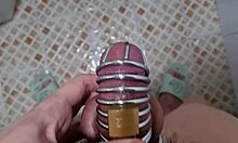 Young man masturbates with pee play and chastity belt