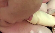 Amateur video features a young girl with natural tits sucking her friend's pussy